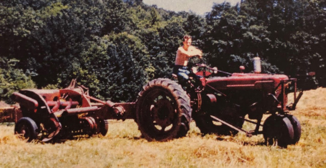 Lyman Wells bailing hay, father of Dan Wells